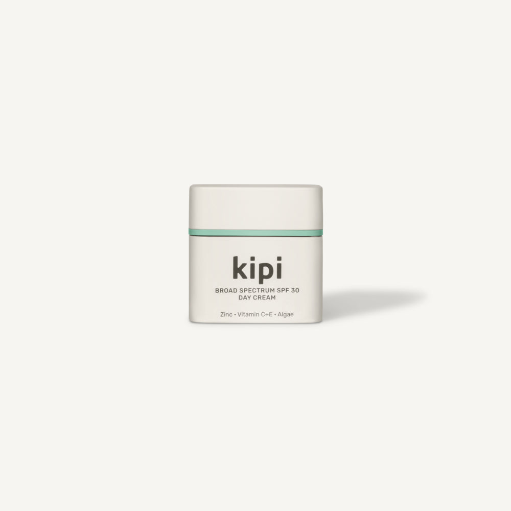 Kipi sunscreen cream jar on a white background