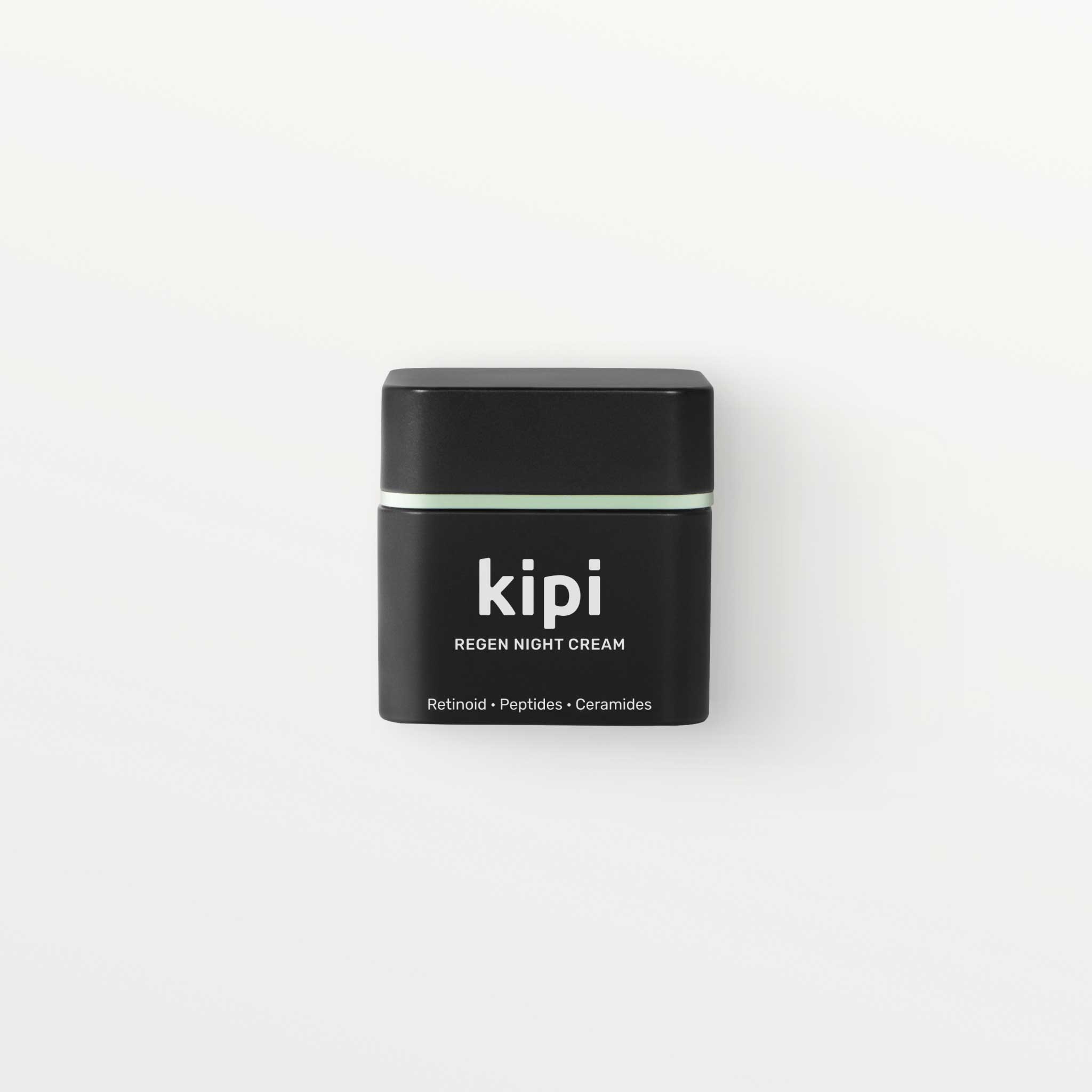 Black jar of kipi Regen Night Cream on a white background