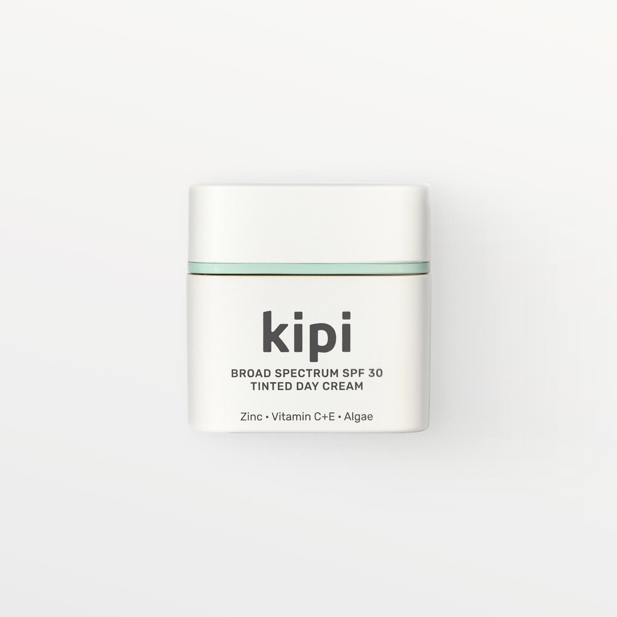 Kipi broad spectrum SPF 30 tinted day cream jar on a white background