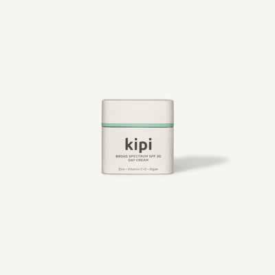 Kipi sunscreen cream jar on a white background