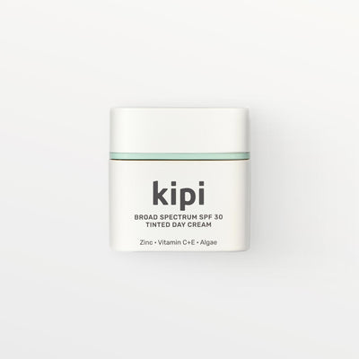 Kipi broad spectrum SPF 30 tinted day cream jar on a white background